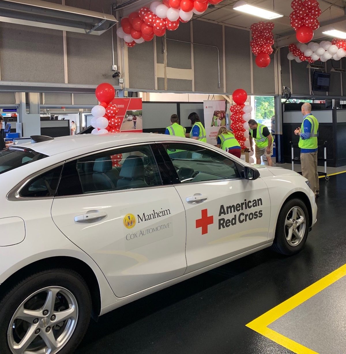 Manheim red cross car